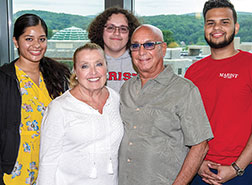Photo of Dominick and Lee LaRuffa with Marist Higher Education Opportunity Program students. Link to Dominick LaRuffa's story.